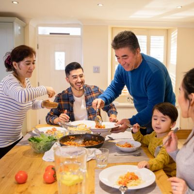 Family enjoying a meal together. 